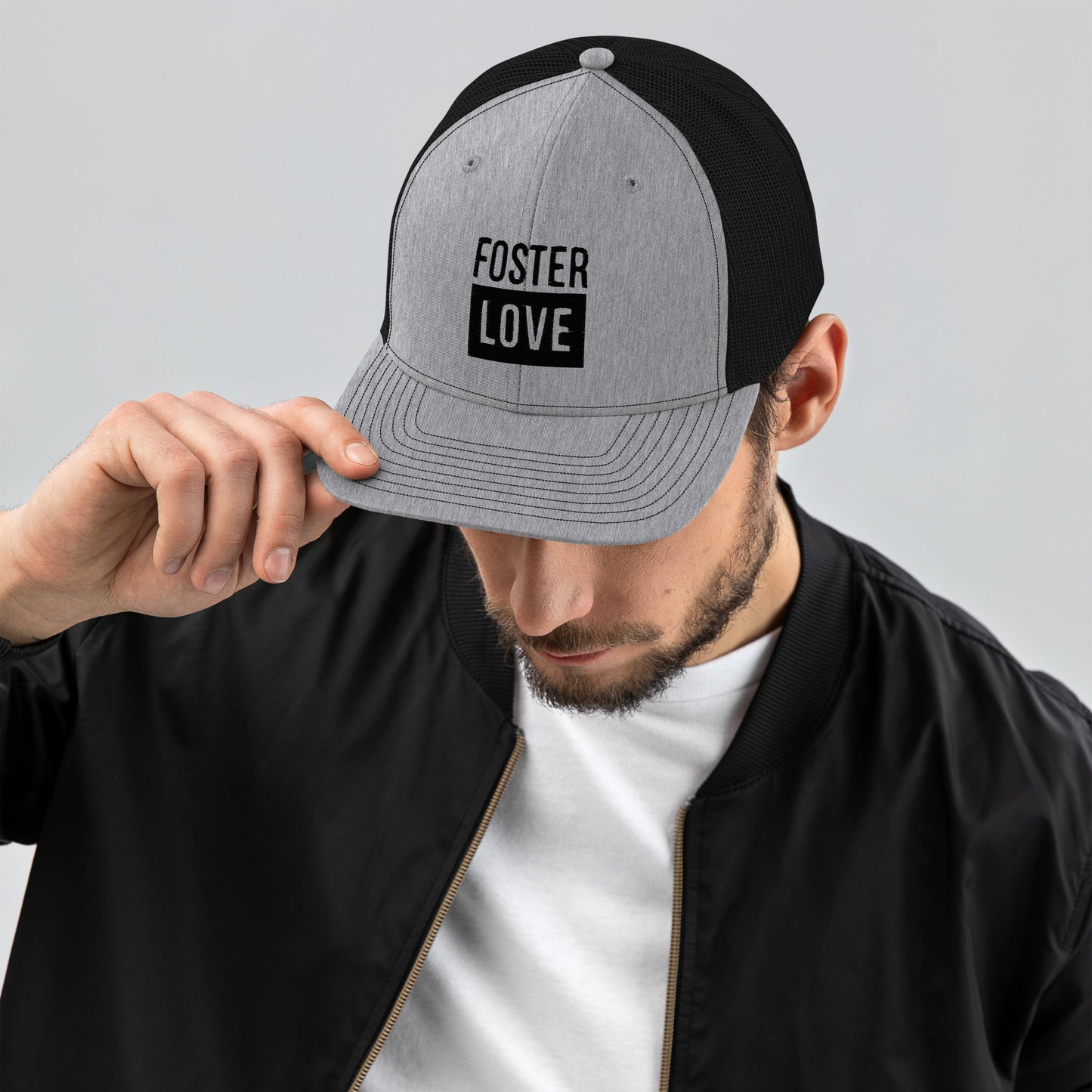 FOSTER LOVE - black embroidery on a Trucker Cap - Adoption Stuff Store